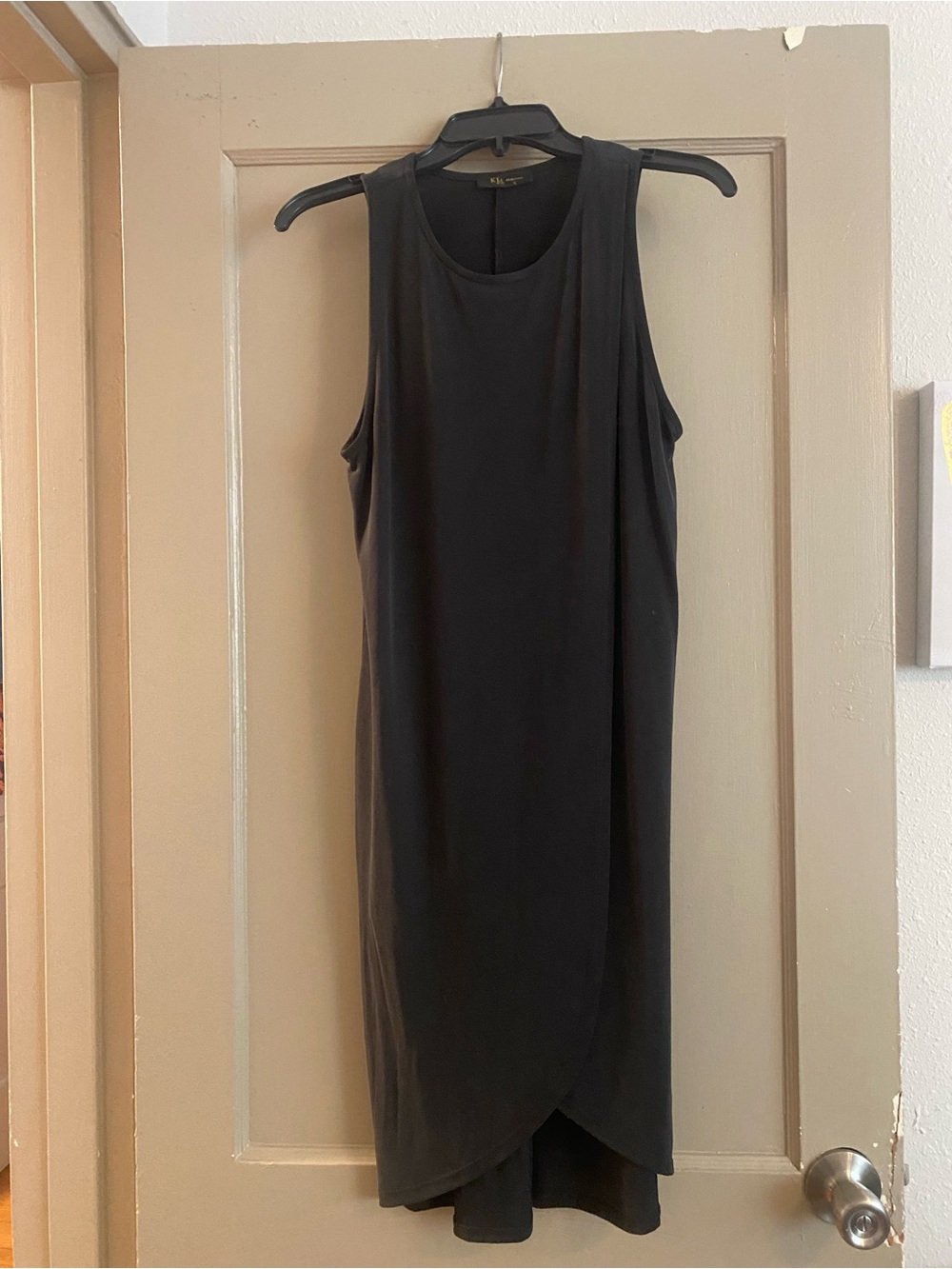 Classic Black Sleeveless Wrap-Hem Dress